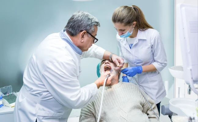 Professional team providing patient care inside a modern dental office in Apex